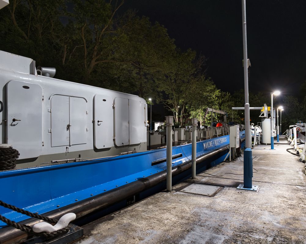 Vessel hull alongside the dock at a port facility