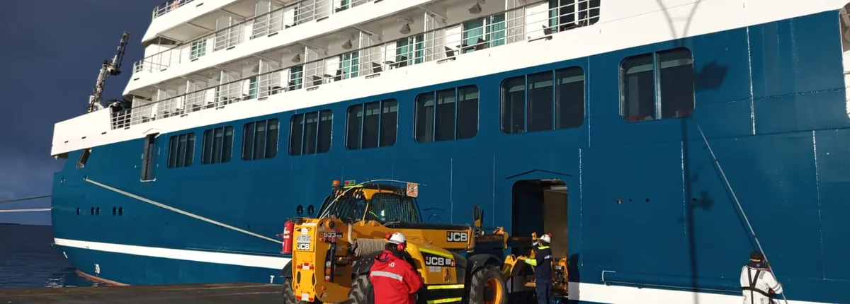 Shackleton's Way team working alongside an expedition vessel at berth