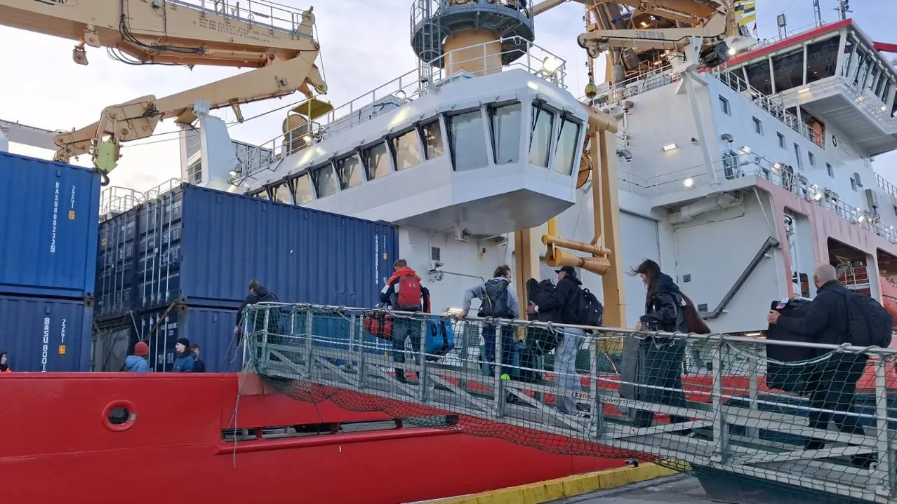 Antarctic program personnel boarding a polar vessel
